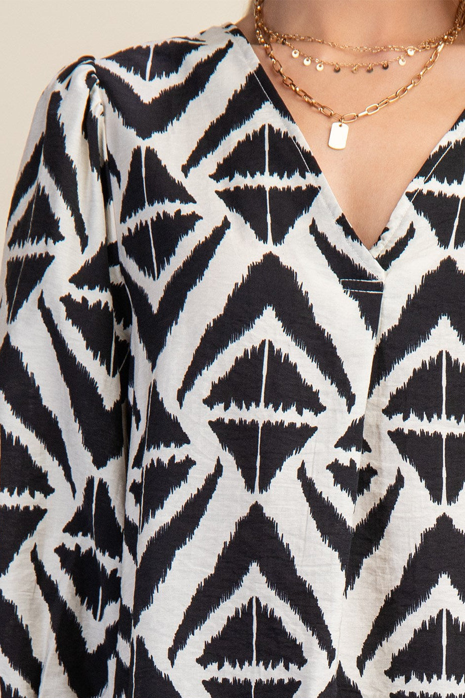 Bold Print V-Neck Blouse with Voluminous Sleeves